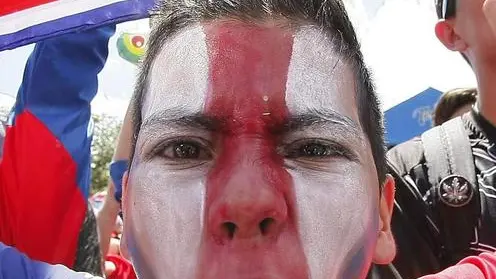 epa04270064 Costa Rican fans celebrate in San Jose, Costa Rica, 20 June 2014, as their team beat Italy in the FIFA World Cup 2014 group stage. Costa Rica beat Italy 1-0 in Recife to advance to the Round of 16 of the World Cup in Brazil. EPA/Jeffrey Arguedas