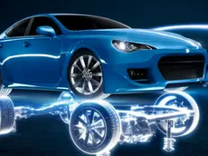 Blue car with glowing car frame in reflection --- Image by © Viaframe/Corbis