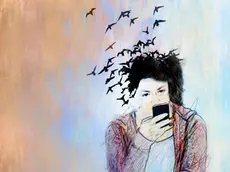 Conceptual illustration of a young woman on a smartphone her hair is turning into birds and flying away depicting loss of connection with the real wor...