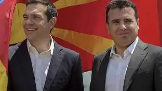 epa06815071 Greek Prime Minister Alexis Tsipras (L) and FYROM Prime Minister Zoran Zaev (R) shake hands after their arrival on Macedonian side of the Lake Prespa, near Otesevo, the Former Yugoslav Republic of Macedonia (FYROM), 17 June 2018. Prime Ministers from Greece and Macedonia meet in the Prespes lake district, that borders both countries, and sign an agreement aimed at ending a decades-long dispute between their countries. The agreement shall lead to the renaming of Greece's northern neighbour, as well as its EU and NATO entry. EPA/NAKE BATEV