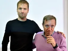 Former Olympic race walking gold medalist Alex Schwazer (L) with World Anti-Doping Agency consultant and coach Sandro Donati during a a press conference in Roma, 01 April 2015. Alex Schwazer announced his new partnership with coach Sandro Donati to return to racing. ANSA / ETTORE FERRARI