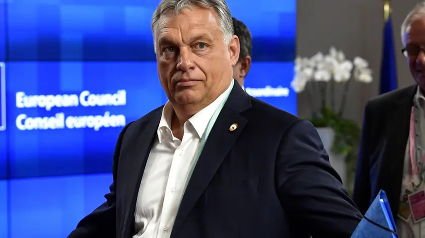 FILE PHOTO: Hungary's Prime Minister Viktor Orban leaves after a meeting of an EU summit on a coronavirus recovery package at the European Council building in Brussels on July 18, 2020. John Thys/Pool via REUTERS/File Photo