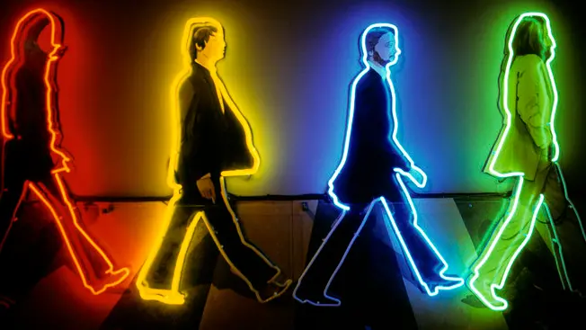 Liverpool, Merseyside, England, UK --- Liverpool, neon shop sign reminding that the Beatles are coming from the city --- Image by © Jean-Pierre Degas/Hemis/Corbis