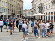 Turisti in centro a Trieste