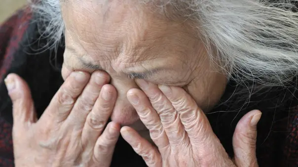 TO GO WITH AFP STORY by SHINGO ITO - FILES - This picture taken on March 25, 2011 shows Tsuyako Ito wiping tears during an interview at a shelter in Kamaishi, Iwate prefecture. The "last geisha" of this once-bustling steel city says she lost everything from her kimono to music instruments as a huge tsunami swept them away, but her performing spirit remains intact. AFP PHOTO / KAZUHIRO NOGI (Photo credit should read KAZUHIRO NOGI/AFP/Getty Images)