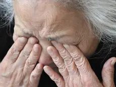 TO GO WITH AFP STORY by SHINGO ITO - FILES - This picture taken on March 25, 2011 shows Tsuyako Ito wiping tears during an interview at a shelter in Kamaishi, Iwate prefecture. The "last geisha" of this once-bustling steel city says she lost everything from her kimono to music instruments as a huge tsunami swept them away, but her performing spirit remains intact. AFP PHOTO / KAZUHIRO NOGI (Photo credit should read KAZUHIRO NOGI/AFP/Getty Images)