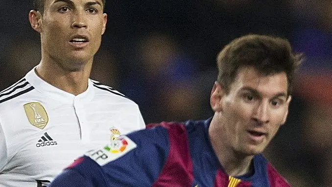 Real Madrid's Portuguese striker Cristiano Ronaldo (L) duels for the ball with FC Barcelona's Argentinian striker Lionel Messi (R) during the Spanish Liga Primera Division soccer match played at Camp Nou stadium, in Barcelona, Spain, 22 March 2015. EFE/Alejandro Garcia