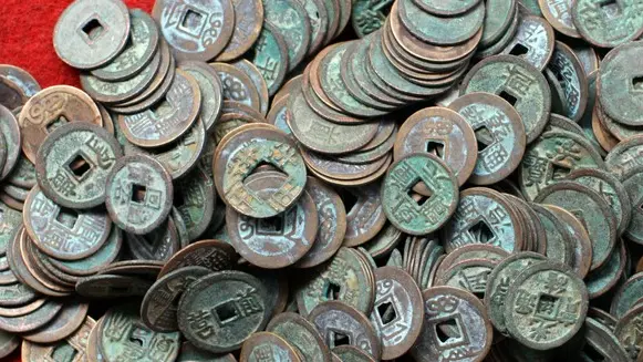 22 May 2012, Beijing, China --- Coins for sale at the Panjiayuan antique market in Beijing --- Image by © Sean Gallagher/National Geographic Society/Corbis