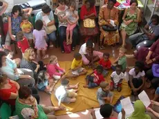 Bambini partecipano a una delle iniziative di "Nati per leggere"