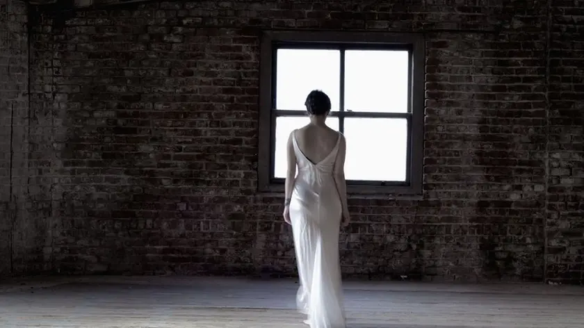 Ghostly Bride in attic --- Image by © Elisa Lazo de Valdez/Corbis