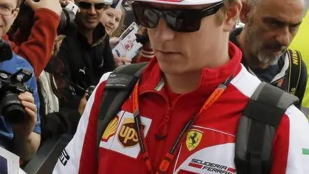 epa04658568 Finnish Formula One driver Kimi Raikkonen of Scuderia Ferrari signs autographs for fans at the Albert Park circuit for the Australian Formula One Grand Prix in Melbourne, Australia, 12 March 2015. The 2015 Formula One Grand Prix of Australia will take place on 15 March. EPA/SRDJAN SUKI