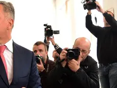 epa05587692 Montenegrin Prime Minister Milo Djukanovic casts his ballot during Montenegro's parliamentary elections in Podgorica, 16 October 2016. The vote could possibly end the 27-year long ruling of Montenegro's ruling Democratic Party of Socialists (DPS) party. The election campaign in the ex-Yugoslav country focused on joining the European Union and NATO. EPA/BORIS PEJOVIC CAPTION CORRECTION: