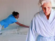 An elderly woman with a home care worker --- Image by © Whisson/Jordan/Corbis