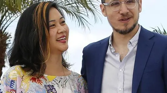 epa04759771 Italian director Roberto Minervini (R) and screenwriter Denise Ping Lee (L) pose during the photocall for 'The Other Side' at the 68th annual Cannes Film Festival, in Cannes, France, 21 May 2015. The movie is presented in the section Un Certain Regard of the festival which runs from 13 to 24 May. EPA/GUILLAUME HORCAJUELO