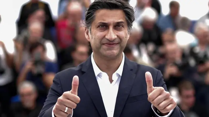 epa07586684 British director Asif Kapadia poses during the photocall for 'Diego Maradona' at the 72nd annual Cannes Film Festival, in Cannes, France, 20 May 2019. The movie is presented out of competition at the festival which runs from 14 to 25 May. EPA/GUILLAUME HORCAJUELO