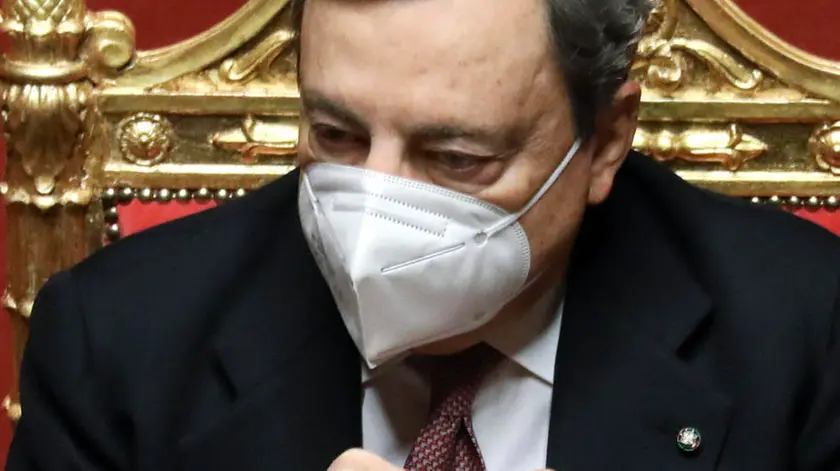 Mario Draghi, Italy's prime minister, listens during a debate at the Senate in Rome, Italy, on Wednesday, Feb. 17, 2021. Italy's Prime Minister Mario Draghi will address the Senate in the morning with his first speech, according to government website, and will face confidence vote in late evening. ALESSIA PIERDOMENICO/ BLOOMBERG/ POOL/ ANSA