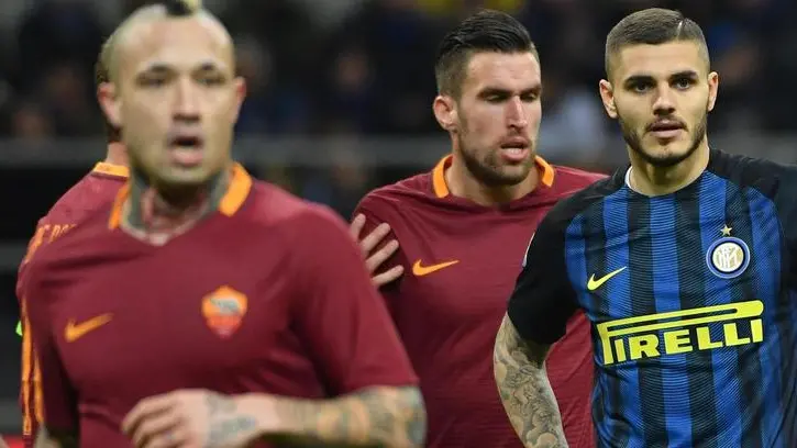 Inter Milan's forward Mauro Icardi (R) reacts during the Serie A soccer match between FC Internazionale Milan and AS Roma at the Giuseppe Meazza stadium in Milan, Italy, 26 February 2017. ANSA/ DANIEL DAL ZENNARO