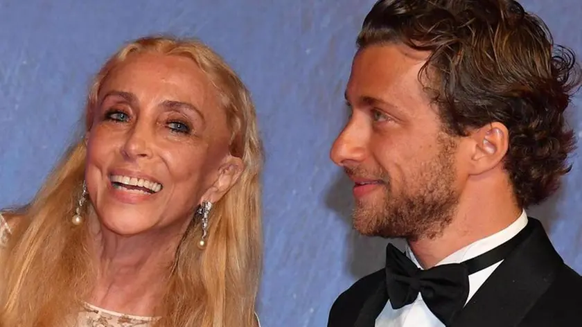 Italian journalist and editor-in-chief of Vogue Italia Franca Sozzani (L) and her son Italian director Francesco Carrozzini arrive for the premiere of 'Franca: Chaos and Creation' during the 73rd Venice Film Festival in Venice, Italy, 02 September 2016. The movie is presented in the 'Cinema nel Giardino' section at the festival running from 31 August to 10 September. ANSA/ETTORE FERRARI