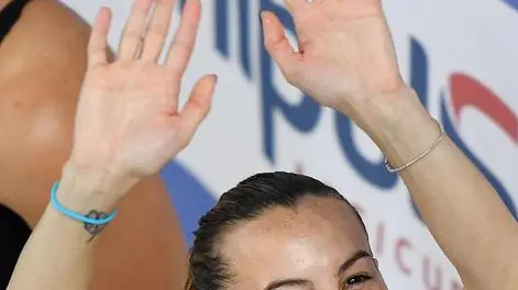 Italian diver Tania Cagnotto celebrates after winning the women's 1m Platoform final at the 2017 Absolute Italian Diving Championship at Piscina Monumentale indoor pool in Turin, Italy, 13 May 2017. ANSA/ALESSANDRO DI MARCO