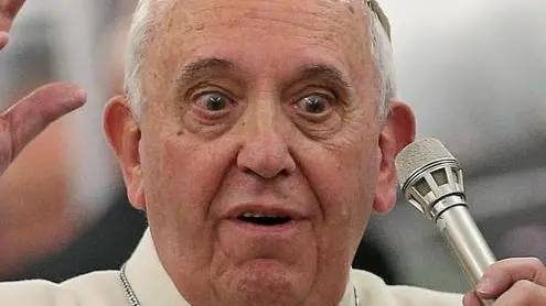 Pope Francis gestures while speaking to journalists aboard the flight from Turkey to Italy, 30 November 2014. Pope Francis visited Turkey from 28 to 30 November 2014. ANSA/ALESSANDRO DI MEO