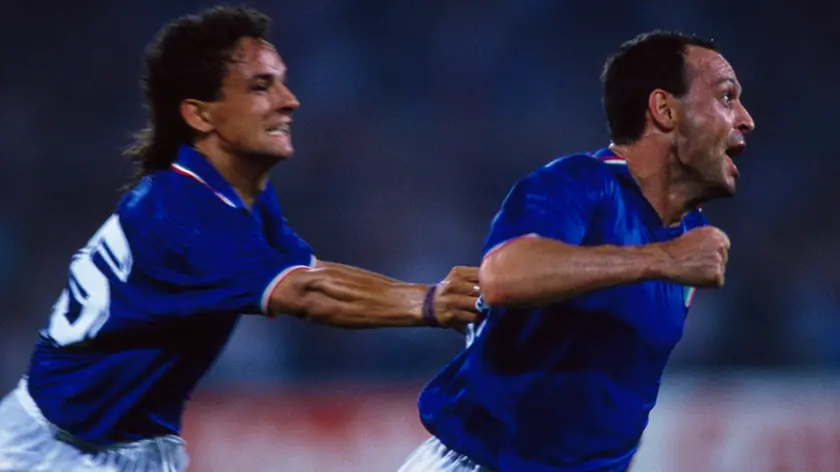 25 Jun 1990, Rome, Italy --- Salvatore "Toto" Schillaci (R) celebrates scoring a goal during a round of 16 match of the 1990 FIFA World Cup against Uruguay. Italy won 2-0. --- Image by © Eric Renard/TempSport/Corbis