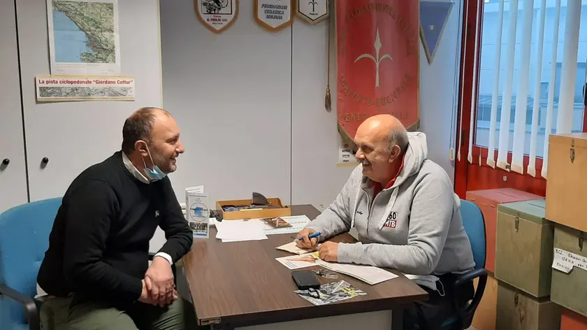 A sinistra il presidente regionale Fci Bandolin, a destra il rieletto presidente provinciale triestino Cortese