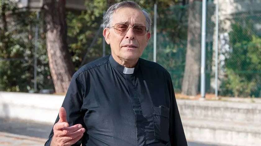 Don Ettore Malnati (Massimo Silvano)