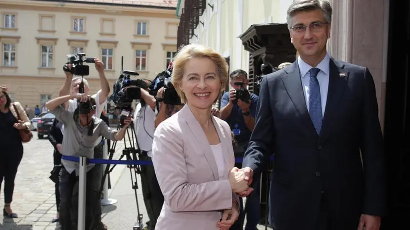 epa07748465 Croatian Prime Minister Andrej Plenkovic (R) welcomes European Commission President Ursula von der Leyen (L) during her official visit in Zagreb, Crotatia, 30 July 2019. EPA/ANTONIO BAT