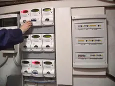 Contatori di energia elettrica in un palazzo, Genova 14 marzo 2018 ANSA/LUCA ZENNARO