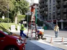 Tecnici al lavoro in piazza Sansovino (Silvano)