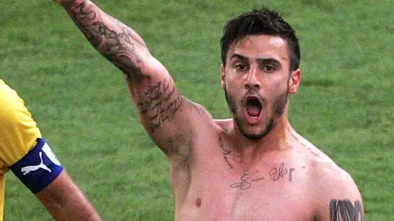 epa03628612 AEK Athens midfielder Giorgos Katidis celebrates by giving the Nazi salute to spectators after scoring the winning goal in his team's 2-1 Super League victory over Veria at the Olympic Stadium in Athens, Greece, 16 March 2013. The 20-year-old Katidis pleaded ignorance of the meaning of his gesture, claiming that he detests fascism. Responding to heavy criticism after the match, Katidis said he was unaware of the implications of his celebration. EPA/STRINGER
