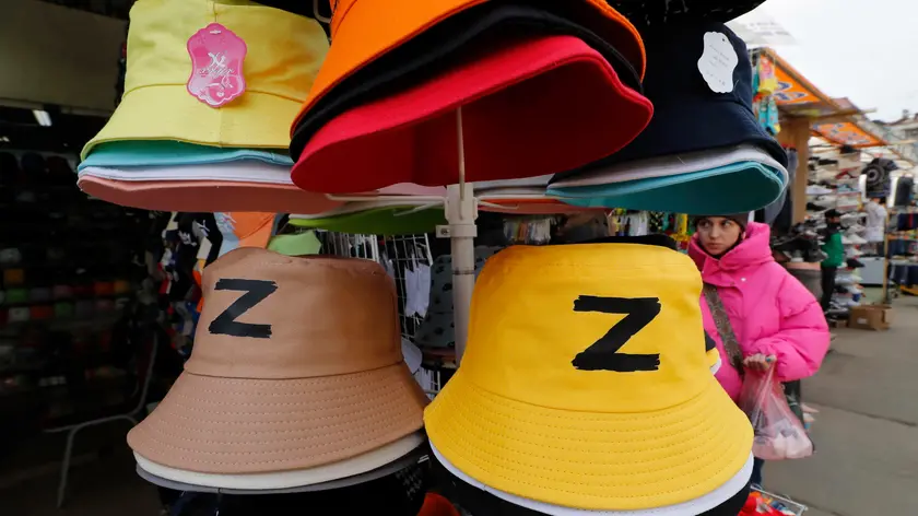 epa09926485 Hats featuring the letter 'Z' on display at the Apraksin market in central St. Petersburg, Russia, 04 May 2022. On 24 February 2022, Russian troops had entered Ukrainian territory in what the Russian president declared a 'special military operation', resulting in fighting and destruction in the country, a huge flow of refugees, and multiple sanctions against Russia. EPA/ANATOLY MALTSEV