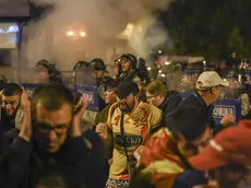 epa05931866 Protesters clash with police after protesters stormed the Parliament when Social Democratic Union of Macedonia with Albanian parties elected new President of the Parliament Talat Dzaferi (not pictured) as they have parliamentary majority, in Skopje, The Former Yugoslav Republic of Macedonia on 27 April 2017. Social Democratic Union of Macedonia with Albanian parties have elected new President of the Parliament, as they have parliamentary majority, President Ivanov didn't give the mandate for a new government, although Zoran Zaev (the leader of SDSM) provided a list of signatures, guaranteeing parliamentary majority he rejected giving him the mandate with explanation that the coalition between Zaev and the Albanian parties (with their platform for two official languages in the country) would destroy the constitutional order in the country. EPA/GEORGI LICOVSKI EPA/GEORGI LICOVSKI