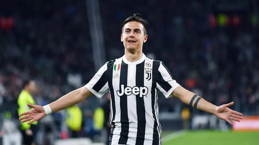 Juventus' Paulo Dybala jubilates after scoring the goal during the Italian Serie A soccer match Juventus FC vs AC Milan at Allianz Stadium in Turin, Italy, 31 March 2018. ANSA/ALESSANDRO DI MARCO