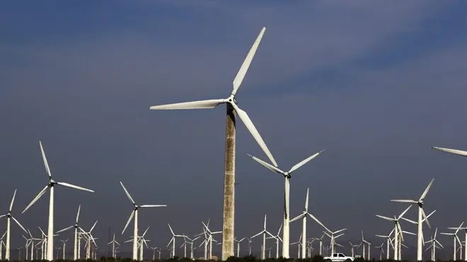 epa02291467 Wind turbines in Dabancheng Wind Power plant in Dabancheng of Xinjiang Uygur autonomous region in China on 18 August 2010. Xinjiang has a typical continental climate and is rich in wind resources with an annual theoretical wind energy reserve of three trillion kwh. Its mountain passes in Turban, Urumqi-Dabancheng, Alataw Pass-Ebinur Lake and Hami are powerful generators of active wind energy. EPA/HOW HWEE YOUNG