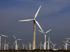 epa02291467 Wind turbines in Dabancheng Wind Power plant in Dabancheng of Xinjiang Uygur autonomous region in China on 18 August 2010. Xinjiang has a typical continental climate and is rich in wind resources with an annual theoretical wind energy reserve of three trillion kwh. Its mountain passes in Turban, Urumqi-Dabancheng, Alataw Pass-Ebinur Lake and Hami are powerful generators of active wind energy. EPA/HOW HWEE YOUNG