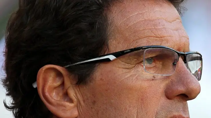 Photo dated 23 June 2010 shows former English head coach Fabio Capello looks on during the FIFA World Cup 2010 group C preliminary round match between Slovenia and England at the Nelson Mandela Bay stadium in Port Elizabeth, South Africa. .ANSA/ROBERT GHEMENT