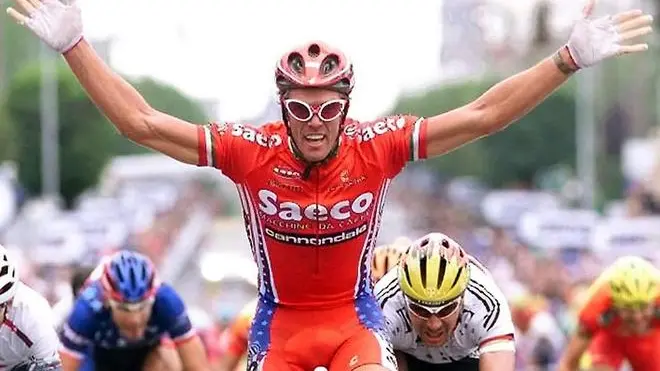 Italian Mario Cipollini jubilates as he crosses the finish line of the 5th stage of the Tour de France in Chateauroux, central France,16 July 1998. ANSA/PASCAL PAVANI