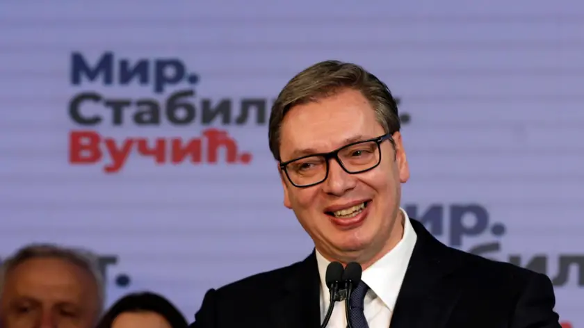 epa09868917 Incumbent Serbian President Aleksandar Vucic celebrates as he presents the early results of the general elections in Belgrade, Serbia, 03 April 2022. EPA/ANDREJ CUKIC
