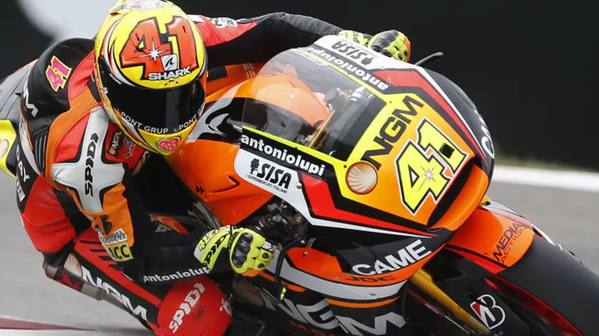 Aleix Espargaro of Spain rides his Yamaha during qualifying of the MotoGP Dutch Grand Prix, in Assen, northern Netherlands, Friday June 27, 2014. Espargaro qualified for pole-position. (AP Photo/Vincent Jannink)