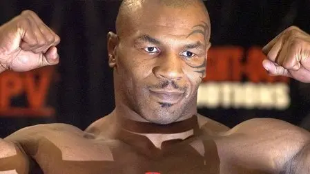 epa000241798 epa000241791 US heavyweight fighter Mike Tyson flexes his muscles on the scales during his weigh-in at 233 pounds for his bout with Danny Williams of London, England in Louisville, Kentucky, Thursday 29 July 2004. The boxers are scheduled to go 10 rounds in Louisville's Freedom Hall on Friday 30th July. EPA/TANNEN MAURY EPA/TANNEN MAURY