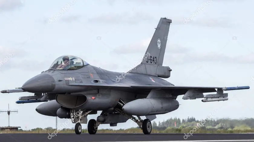 SCHLESWIG-JAGEL, GERMANY - JUN 23, 2014: Royal Netherlands Air Force F-16 fighter jet plane during the NATO Tiger Meet at Schleswig-Jagel airbase.