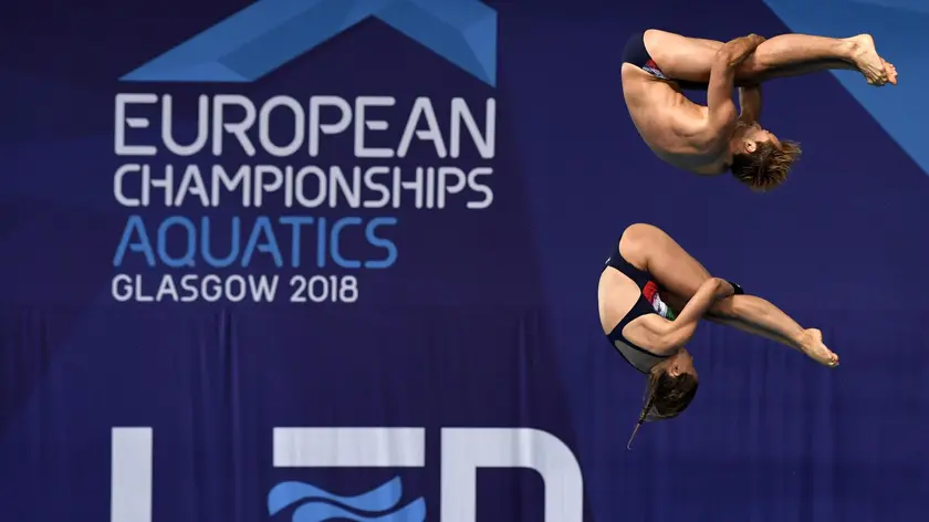 epa06943360 Noemi Batki (bottom) and Maicoi Verzotto (top) of Italy compete in the Synchronised 10 metre Platform Mixed Final at the Glasgow 2018 European Diving Championships, Glasgow, Britain, 11 August 2018. EPA/WILL OLIVER