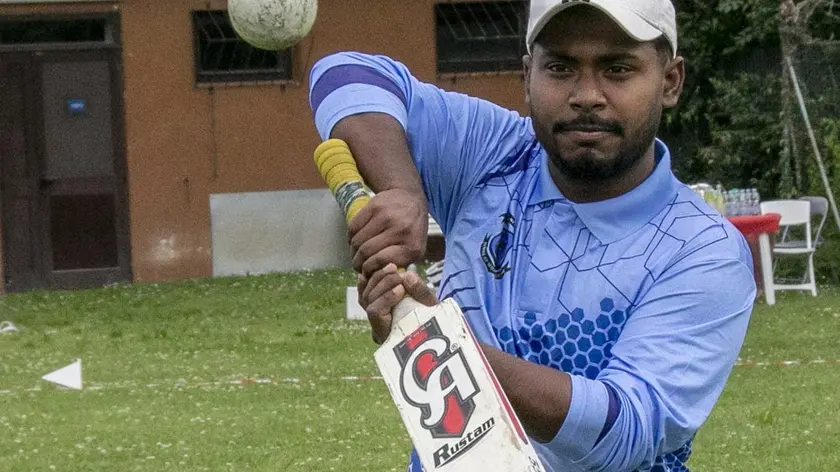 Un atleta del cricket