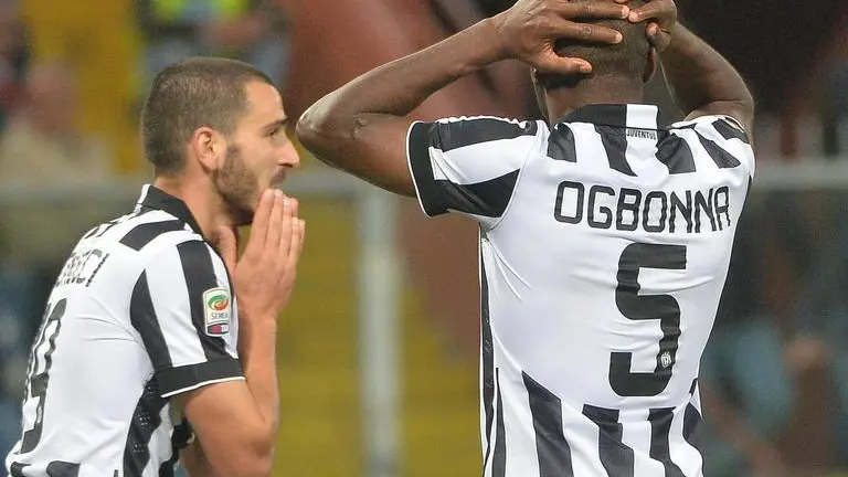 Juventus' Angelo Ogbonna (R) reacts during the Italian Serie A soccer match Genoa CFC vs Juventus FC at Luigi Ferraris stadium in Genoa, Italy, 29 October 2014. ANSA/LUCA ZENNARO