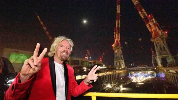 Virgin Group founder, British businessman magnate Sir Richard Branson, poses for a photo during the setting up ceremony of the first cruise ship in the yard of Sestri Ponente, near Genoa, Italy, 31 October 2017. ANSA/LUCA ZENNARO