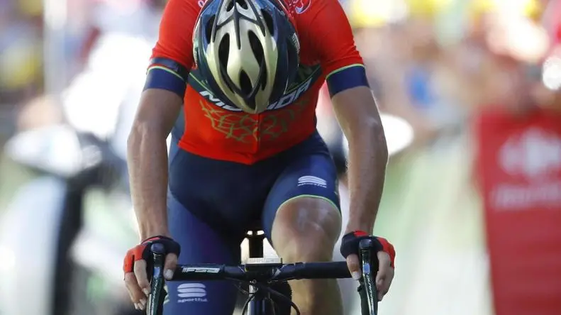 epa06898548 Bahrain Merida team rider Vincenzo Nibali of Italy crosses the finish line during the 12th stage of the 105th edition of the Tour de France cycling race over 175,5km between Bourg-Saint-Maurice Les Arcs and Alpe d'Huez, France, 19 July 2018. EPA/KIM LUDBROOK