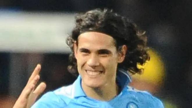 Forward of Napoli, Edinson Cavani (R), jubilates awith his teammates after scoring the goal during the Italy Cup soccer match SSC Napoli vs AC Siena at San Paolo stadium in Naples, Italy on 21 March 2012. ANSA/CIRO FUSCO