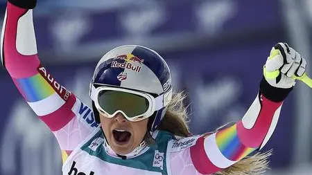 epa04583382 Lindsey Vonn of USA celebrates during the Women's Super G race of the FIS Alpine Skiing World Cup in St. Moritz, Switzerland, 25 January 2015. EPA/PETER SCHNEIDER