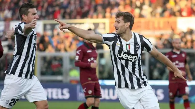 Spanish forward of Fc Juventus, Fernando Llorente, celebrates after scoring the 1-0 goal lead against Livorno Calcio during Italian Serie A soccer match Livorno-Juventus at Armando Picchi Stadium in Livorno, 24 November 2013. ANSA/STEFANO DERRICO